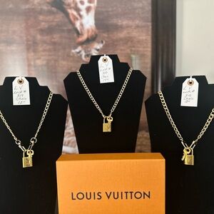 COPY - COPY - Louise Vuitton  lock and key sets with chain.